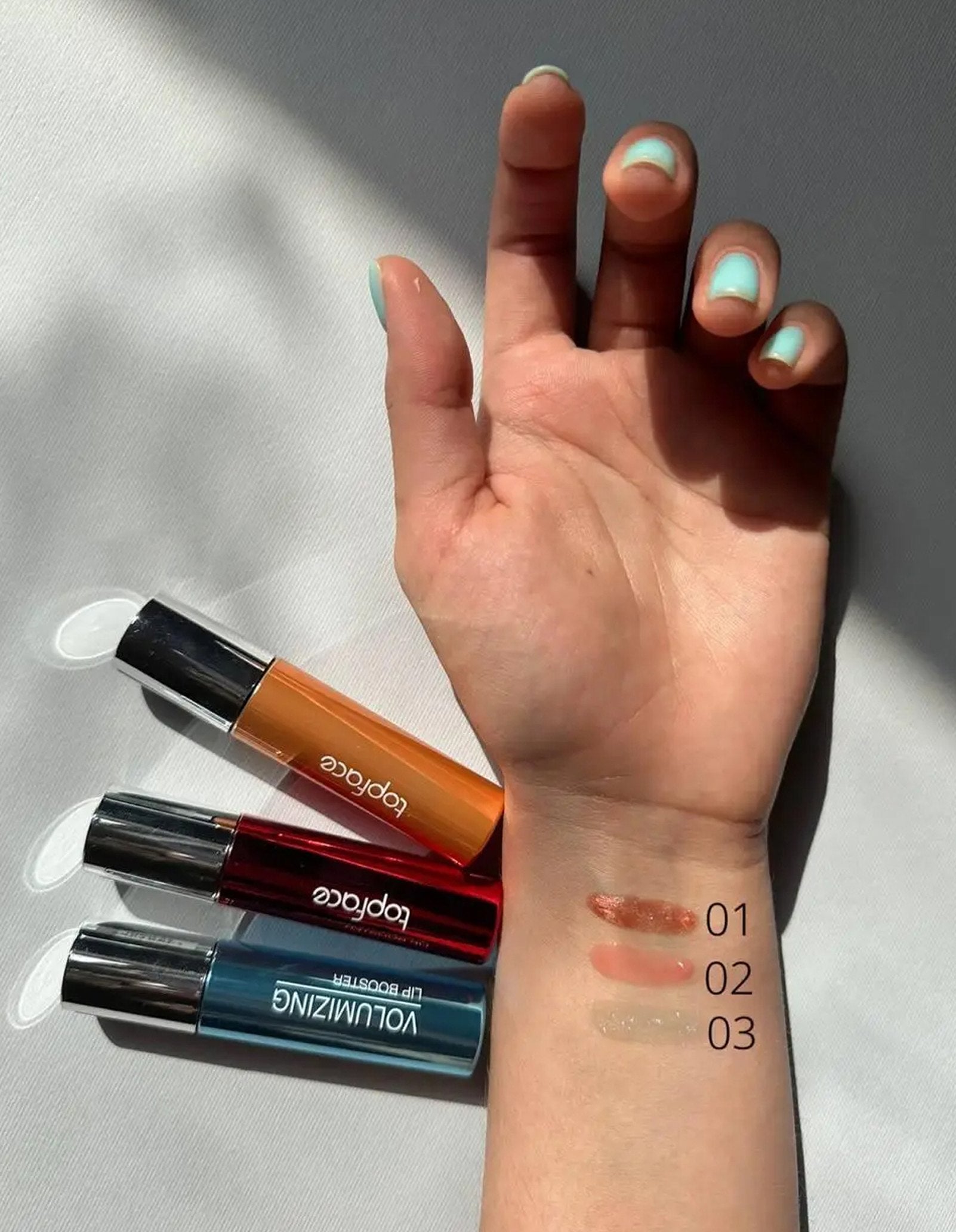 Блиск-бустер для губ Volumizing Lip Booster — Topface